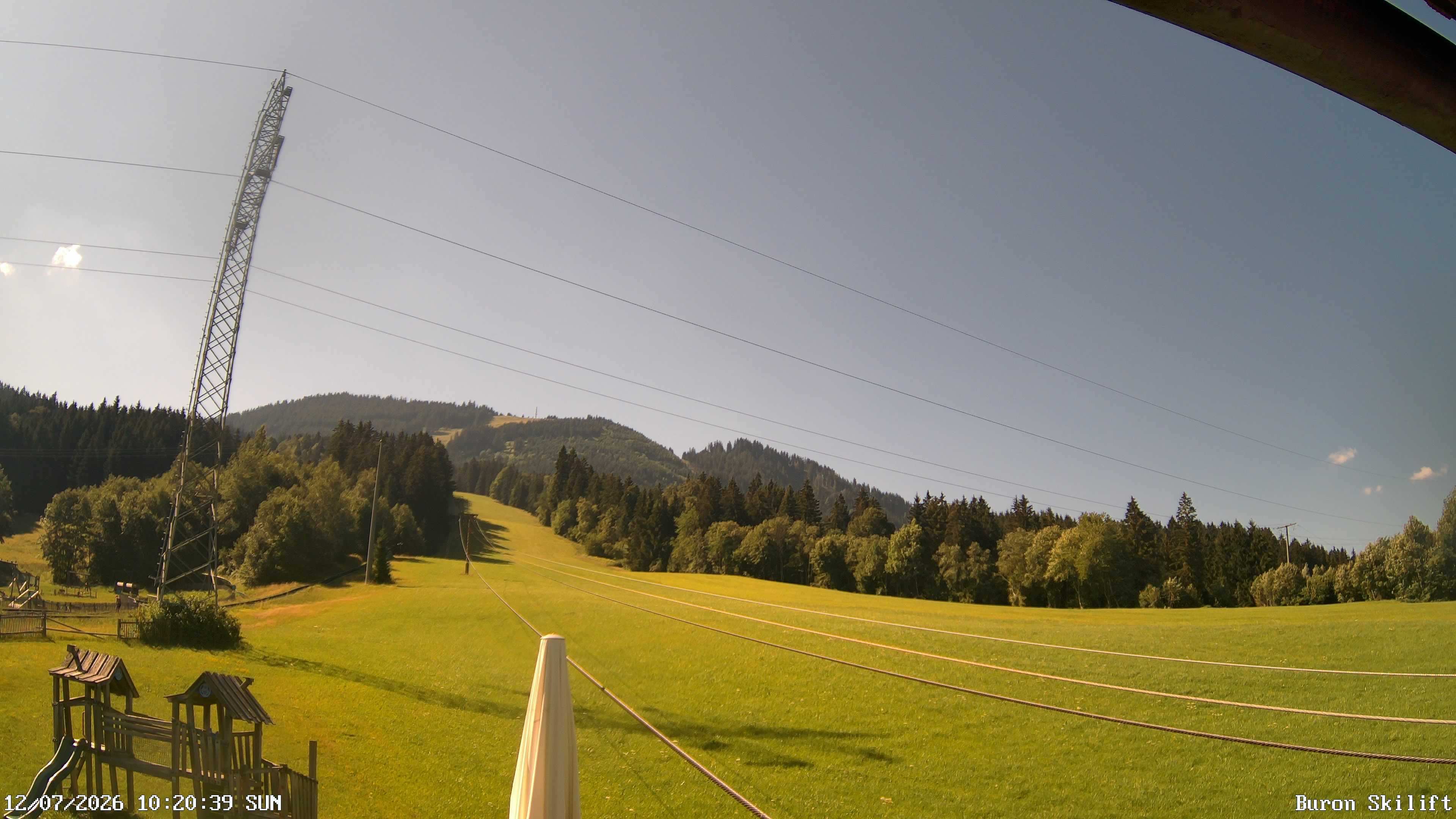 Archived image Webcam Enjoy the panoama view of the ski trail and lift in Buron