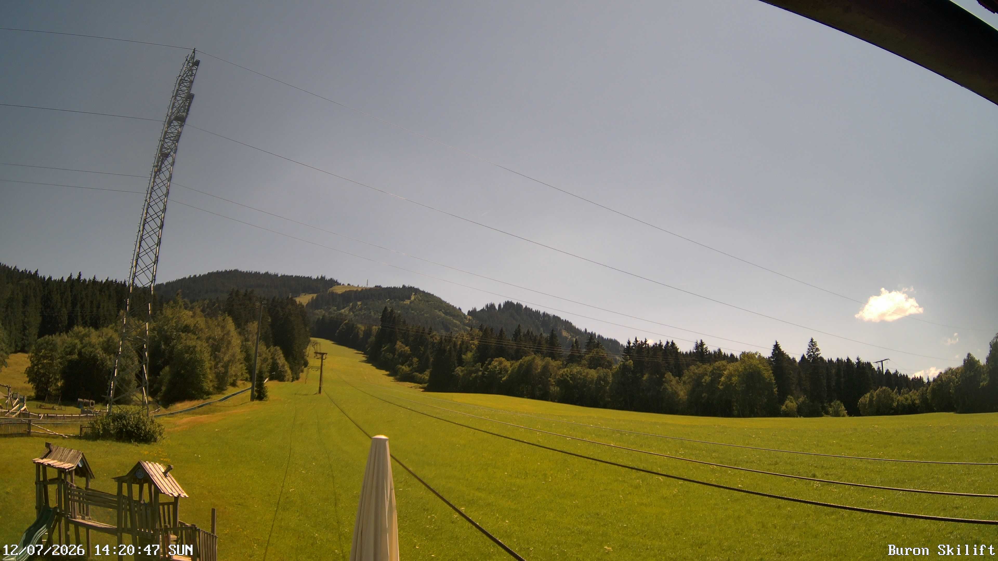 Archived image Webcam Enjoy the panoama view of the ski trail and lift in Buron