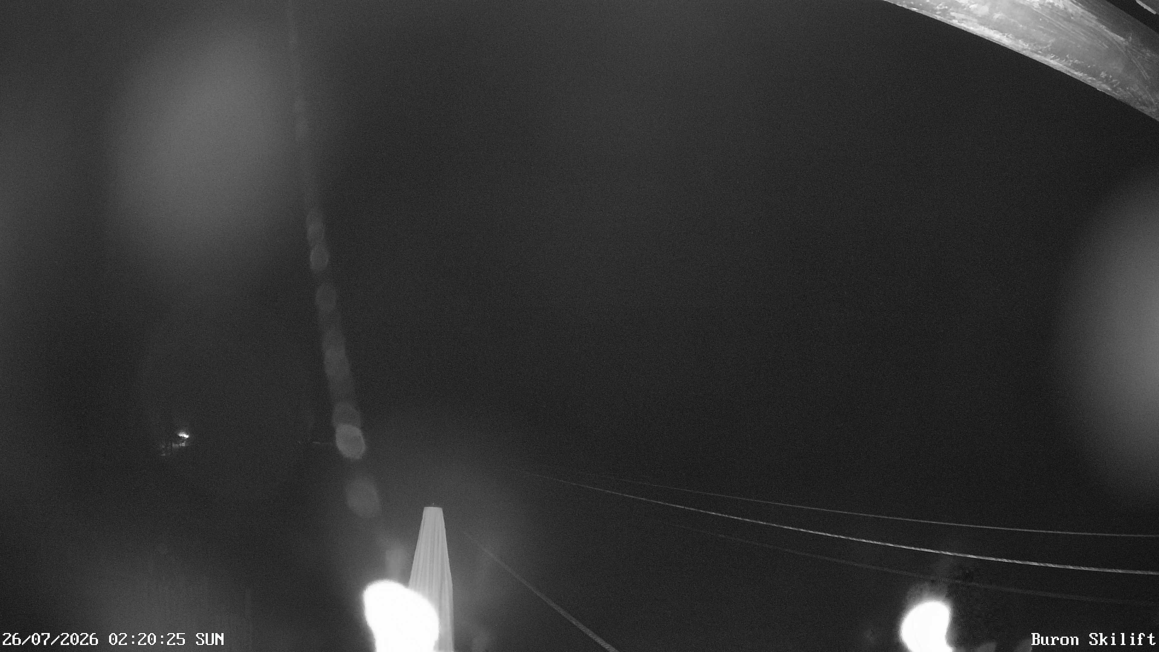 Archiv Foto Webcam Blick von der Talstation des Schlepplifts Buron auf den Lift und die Piste