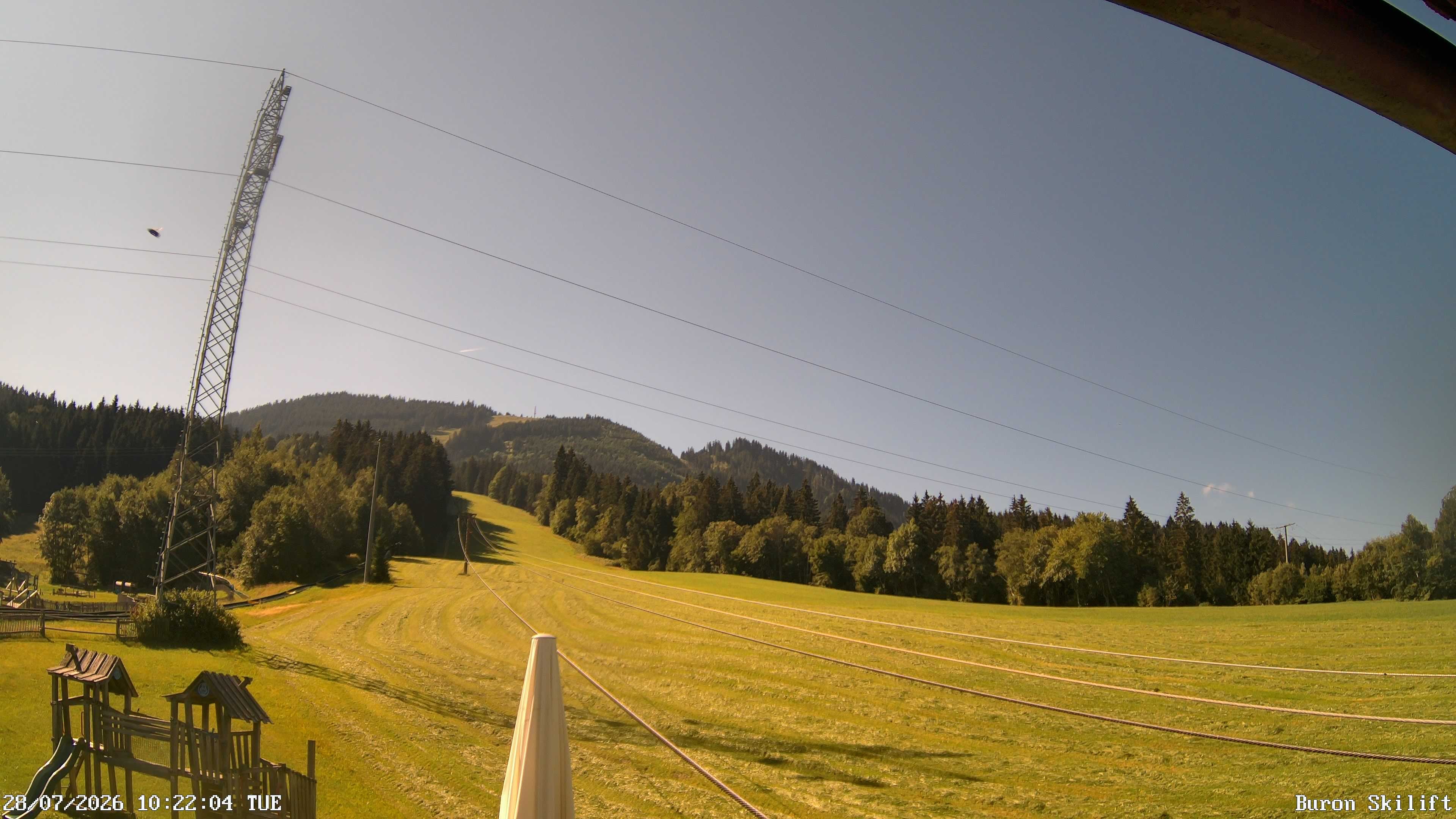 Archiv Foto Webcam Blick von der Talstation des Schlepplifts Buron auf den Lift und die Piste