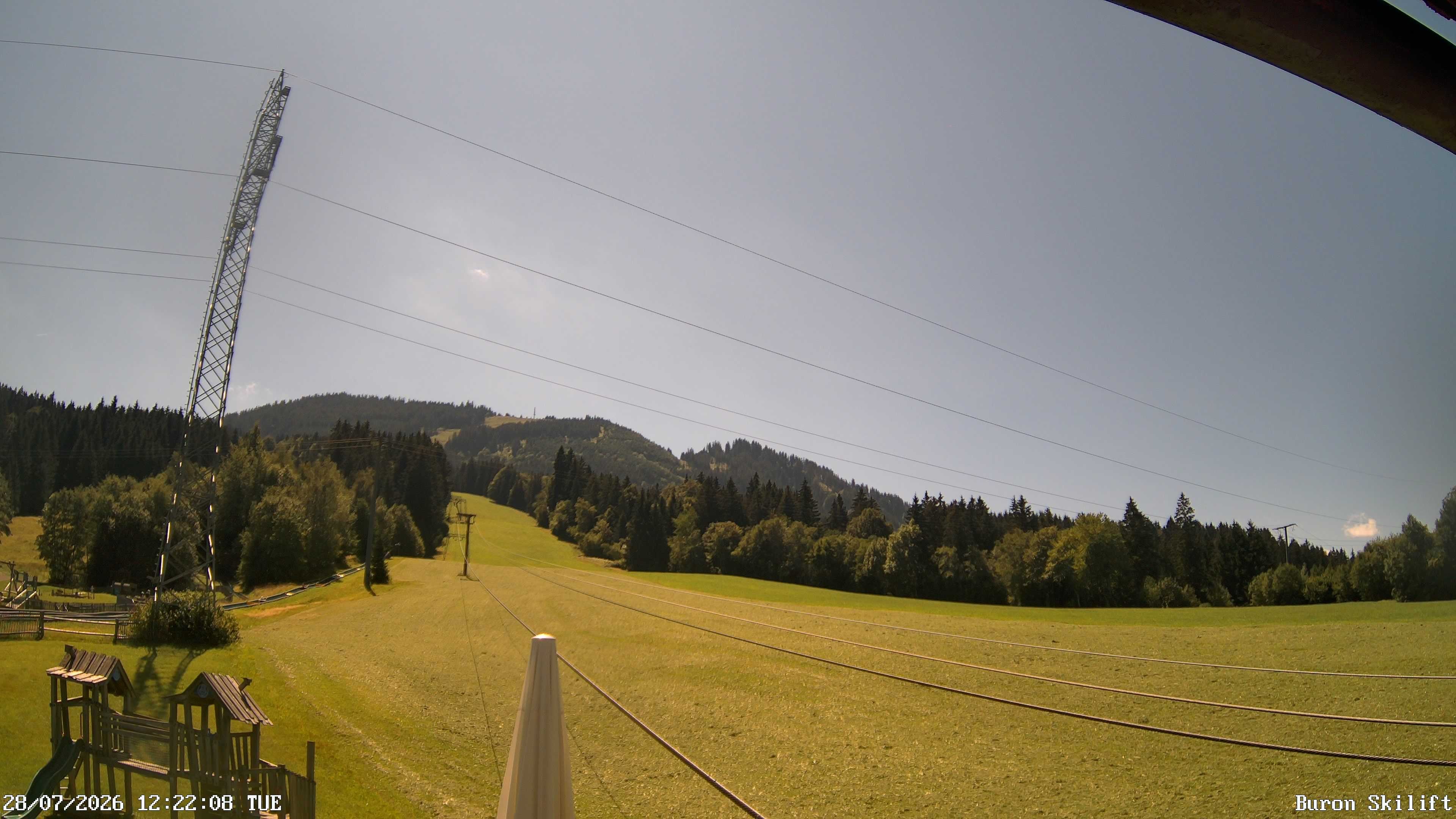 Archiv Foto Webcam Blick von der Talstation des Schlepplifts Buron auf den Lift und die Piste