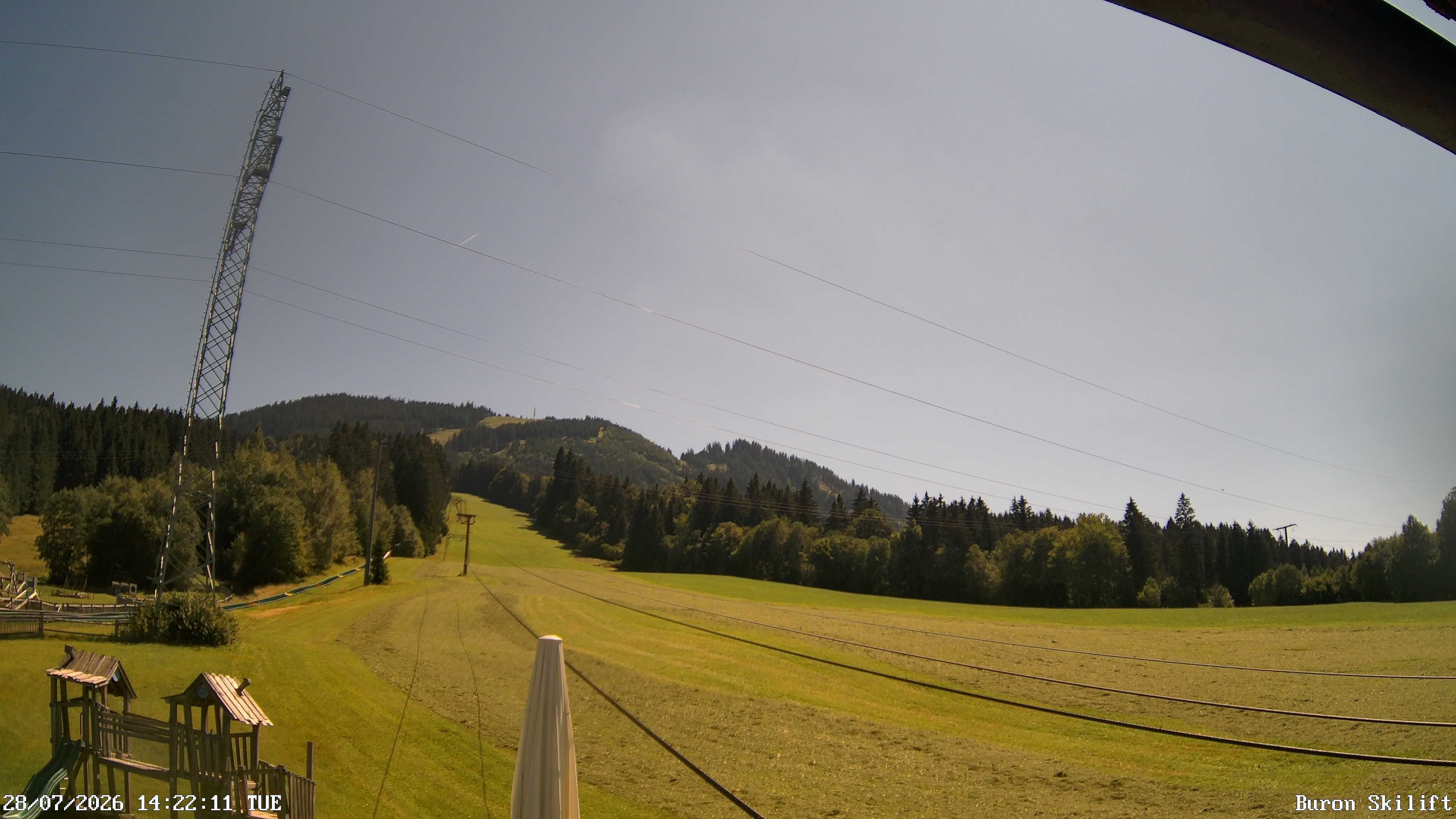 Archiv Foto Webcam Blick von der Talstation des Schlepplifts Buron auf den Lift und die Piste