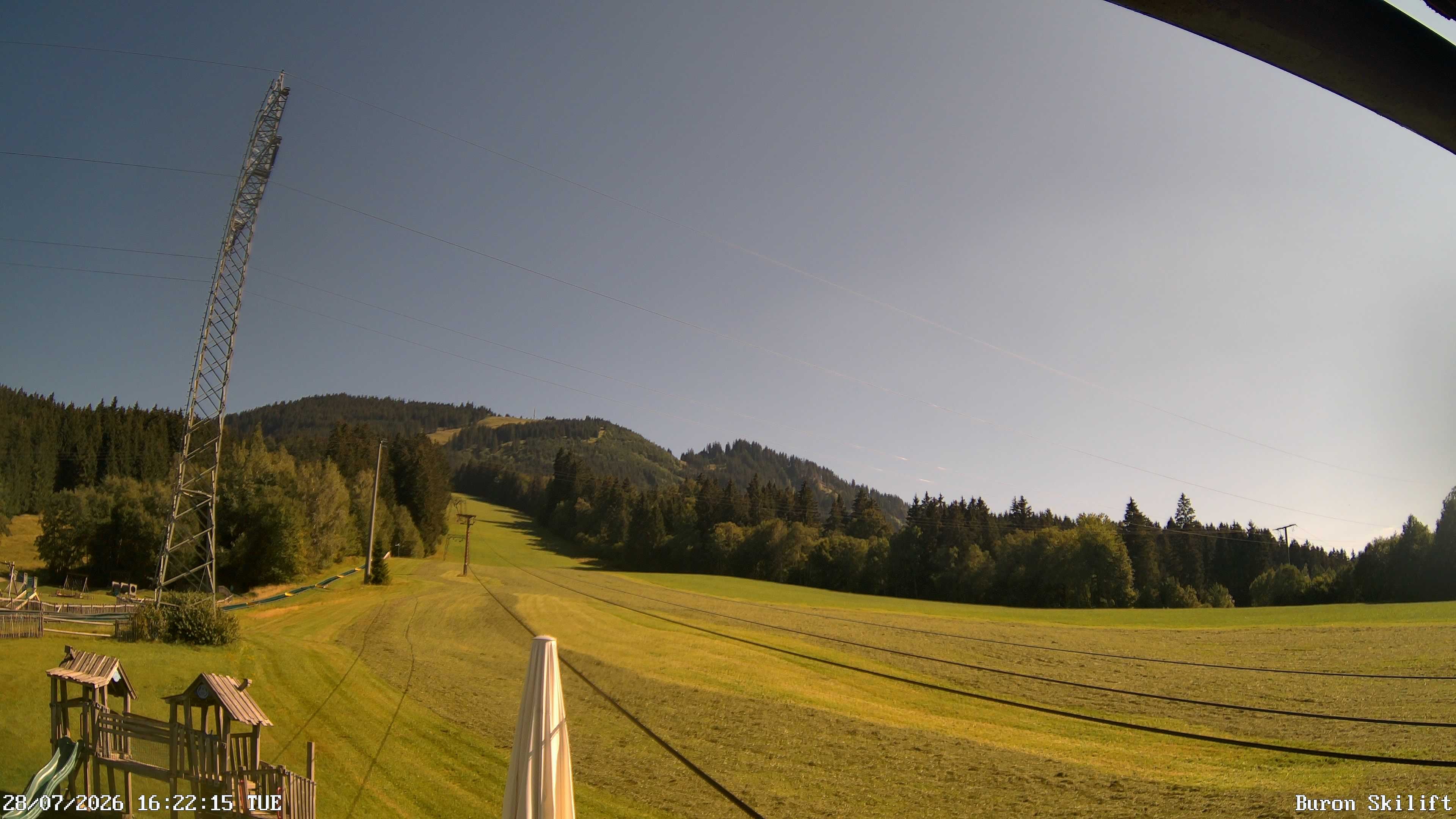 Archiv Foto Webcam Blick von der Talstation des Schlepplifts Buron auf den Lift und die Piste