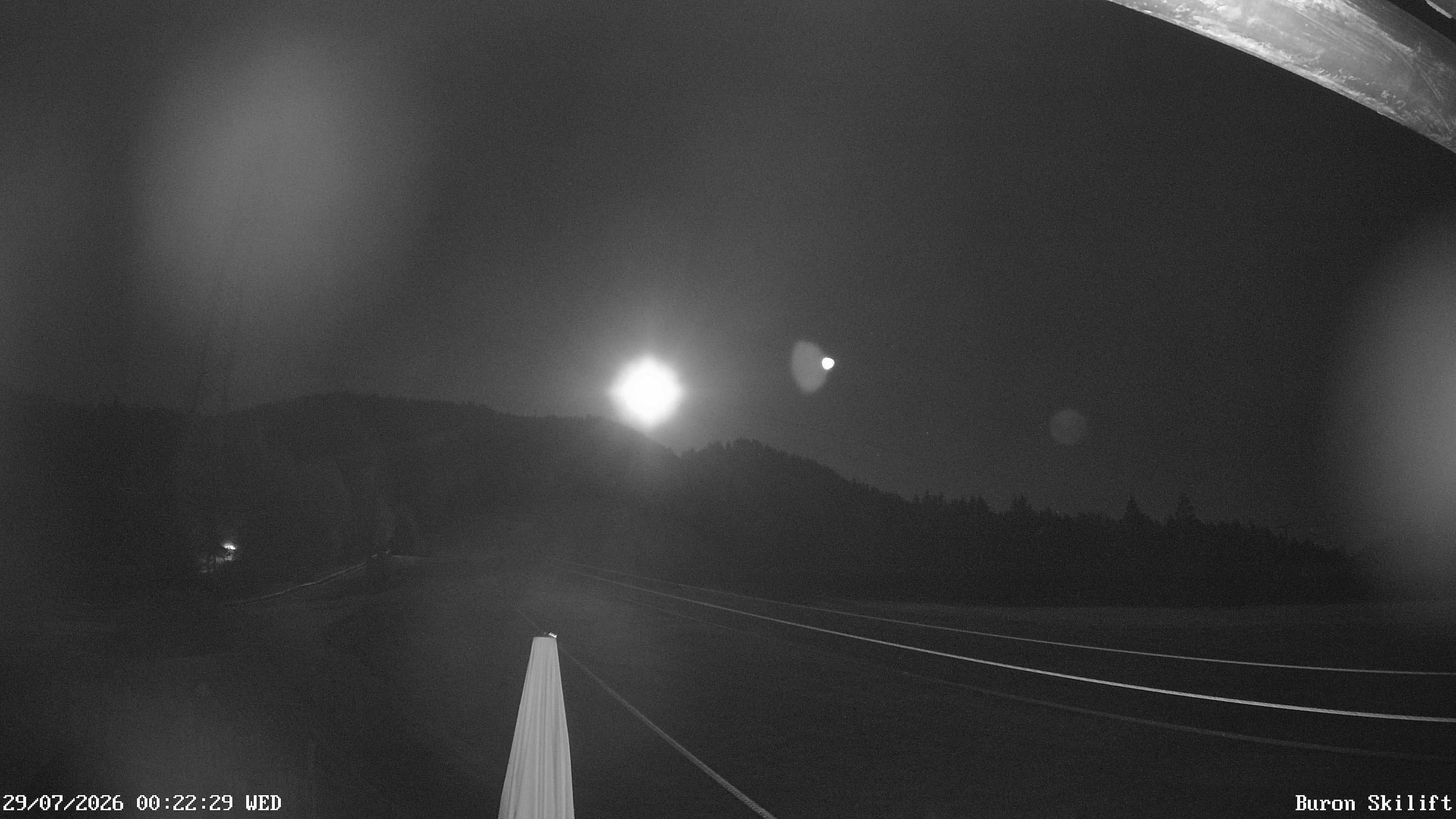Archiv Foto Webcam Blick von der Talstation des Schlepplifts Buron auf den Lift und die Piste