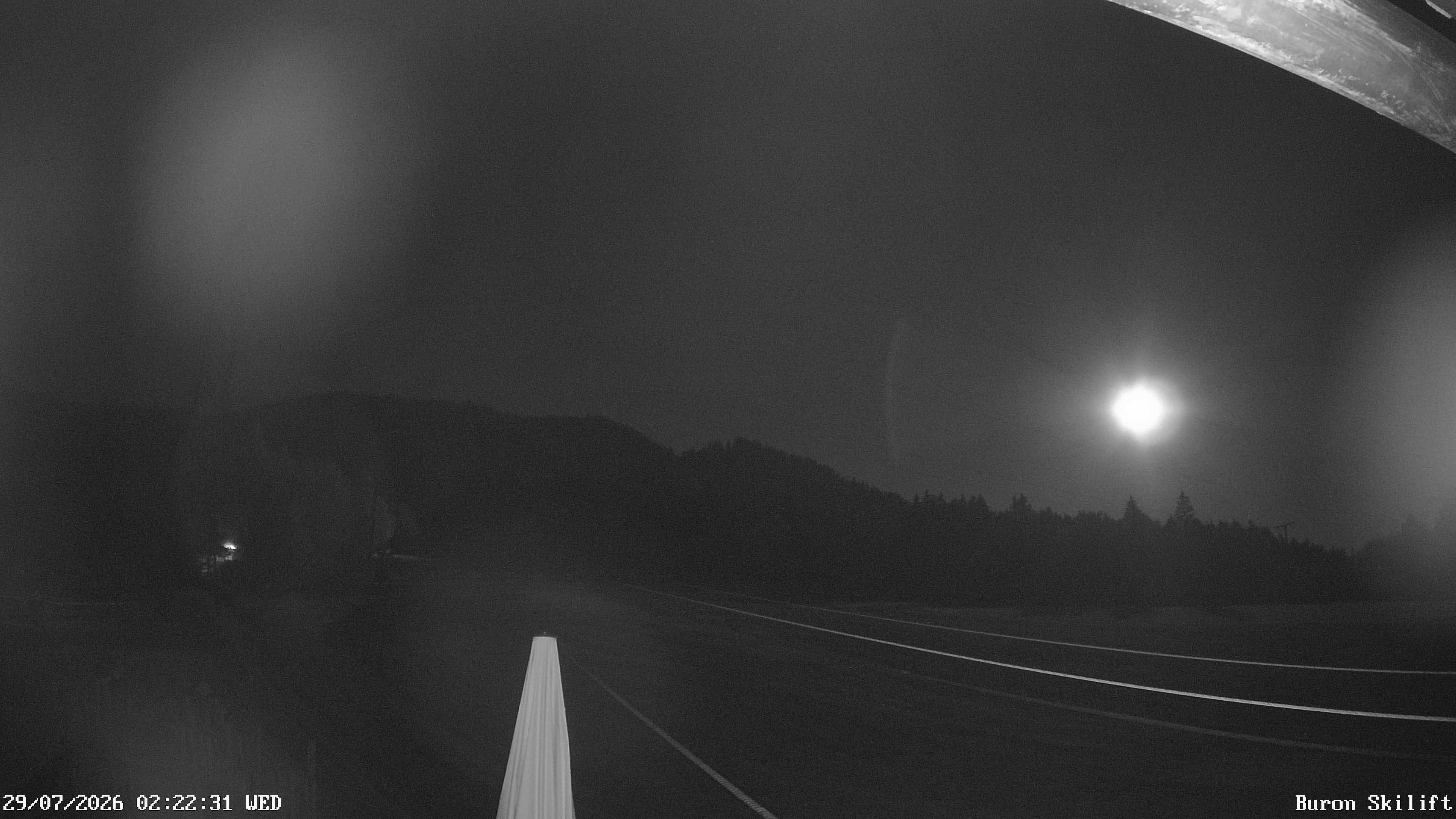 Archiv Foto Webcam Blick von der Talstation des Schlepplifts Buron auf den Lift und die Piste