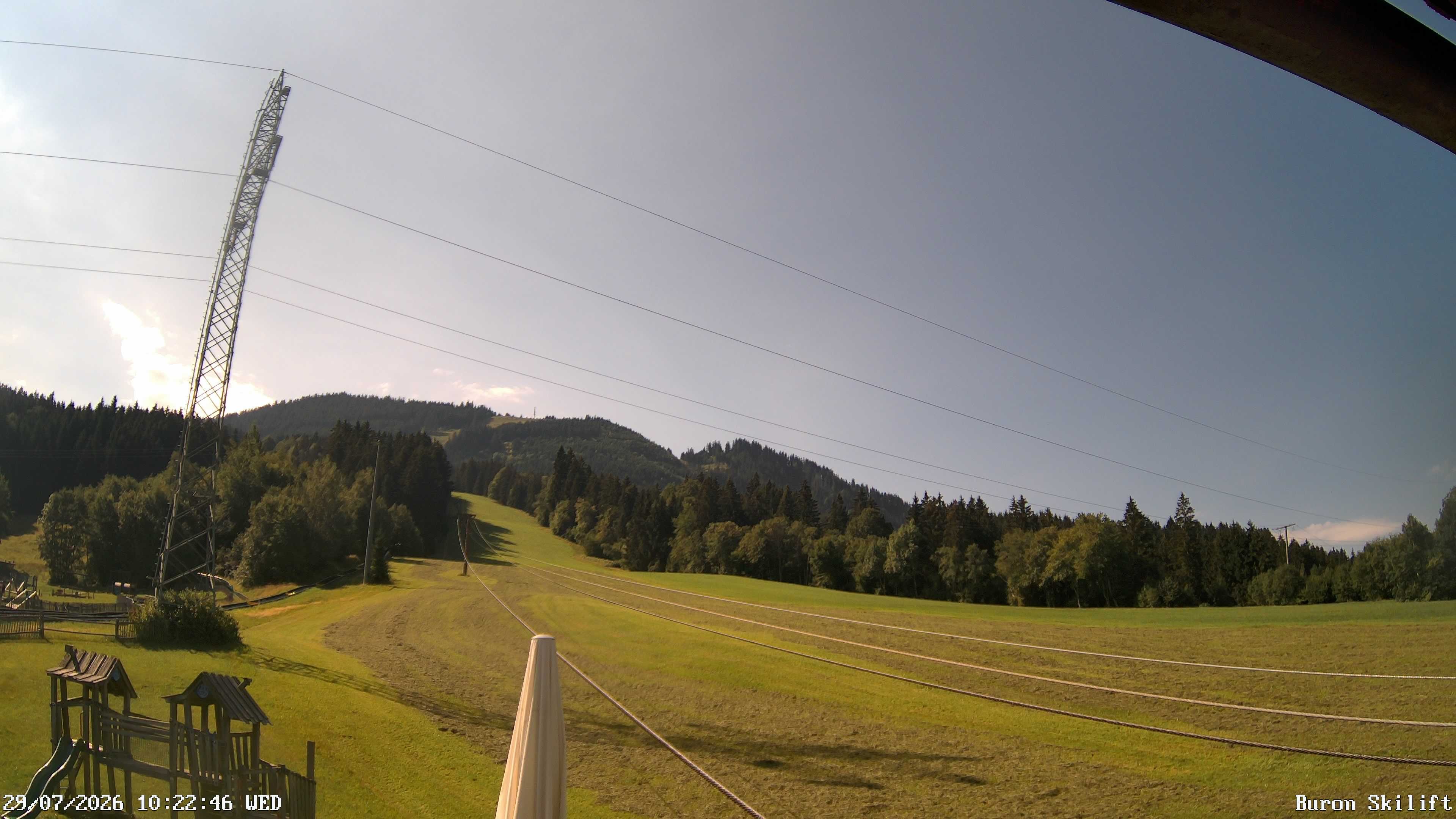 Archiv Foto Webcam Blick von der Talstation des Schlepplifts Buron auf den Lift und die Piste