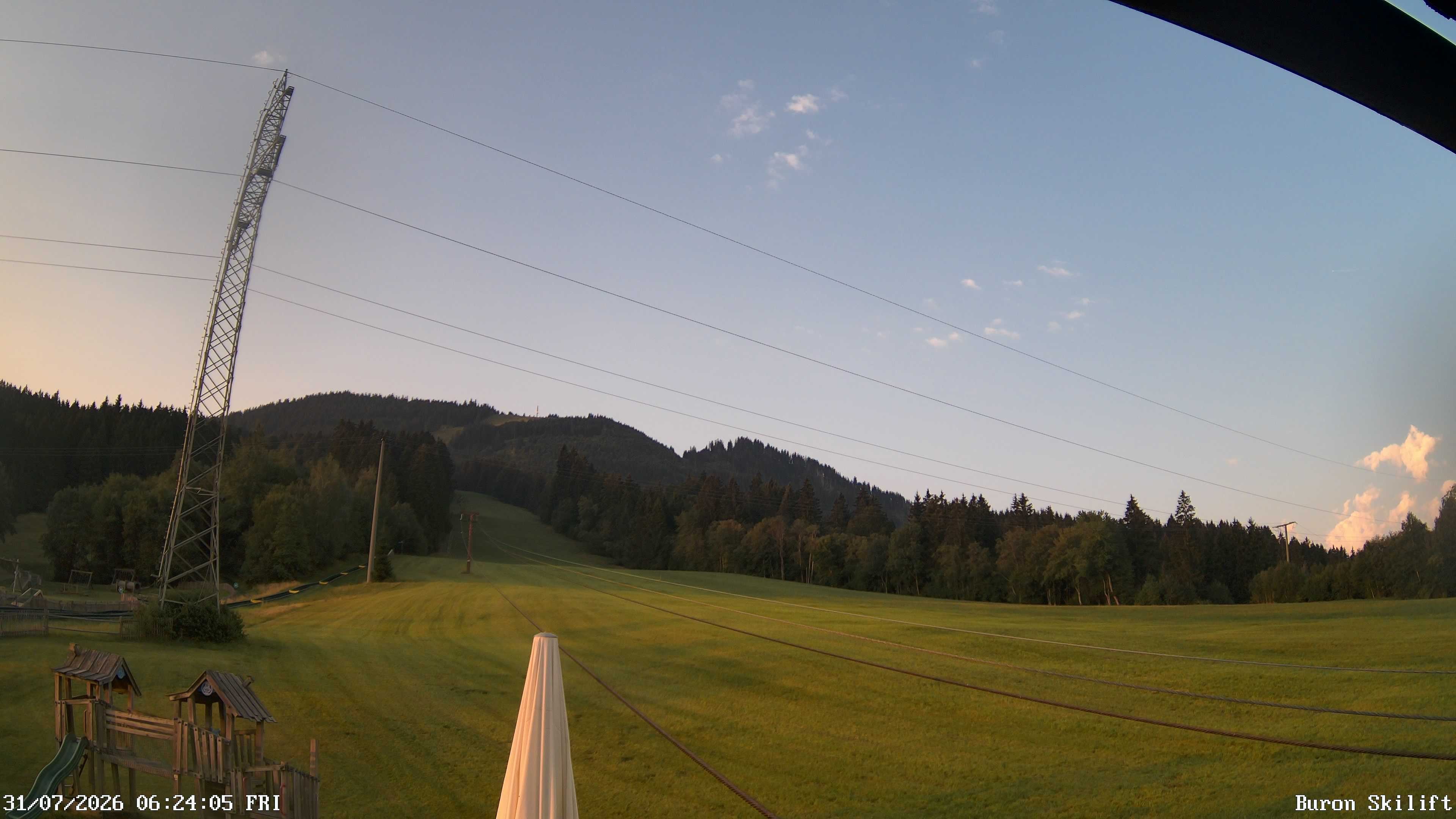 Archived image Webcam Enjoy the panoama view of the ski trail and lift in Buron