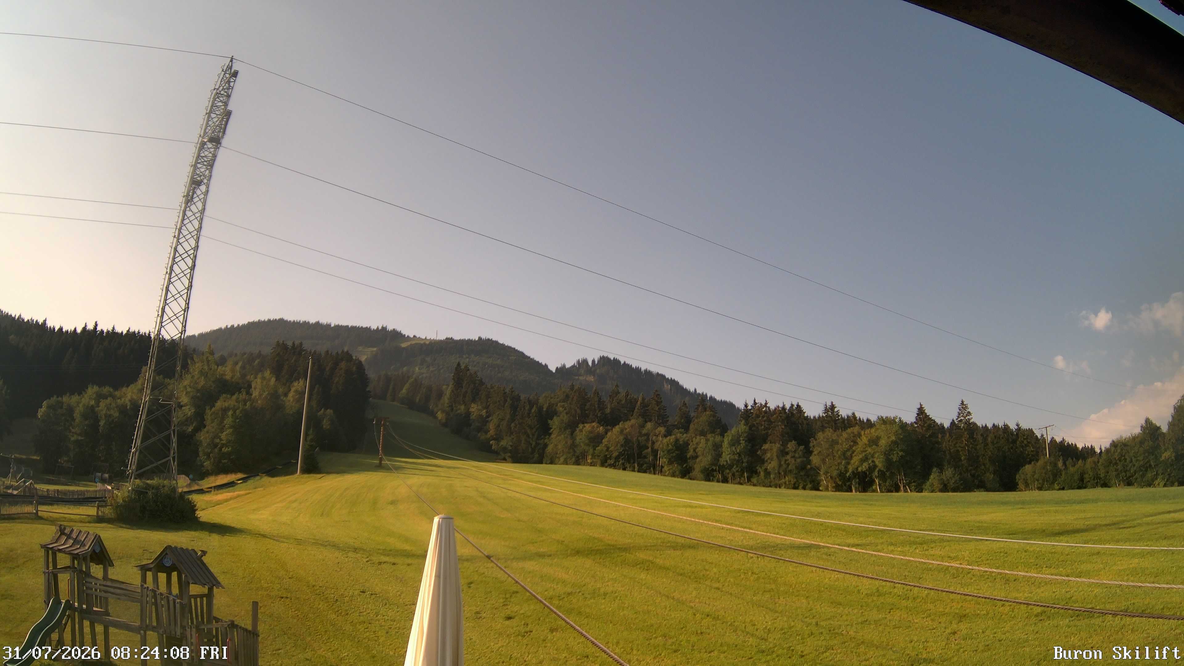 Archived image Webcam Enjoy the panoama view of the ski trail and lift in Buron