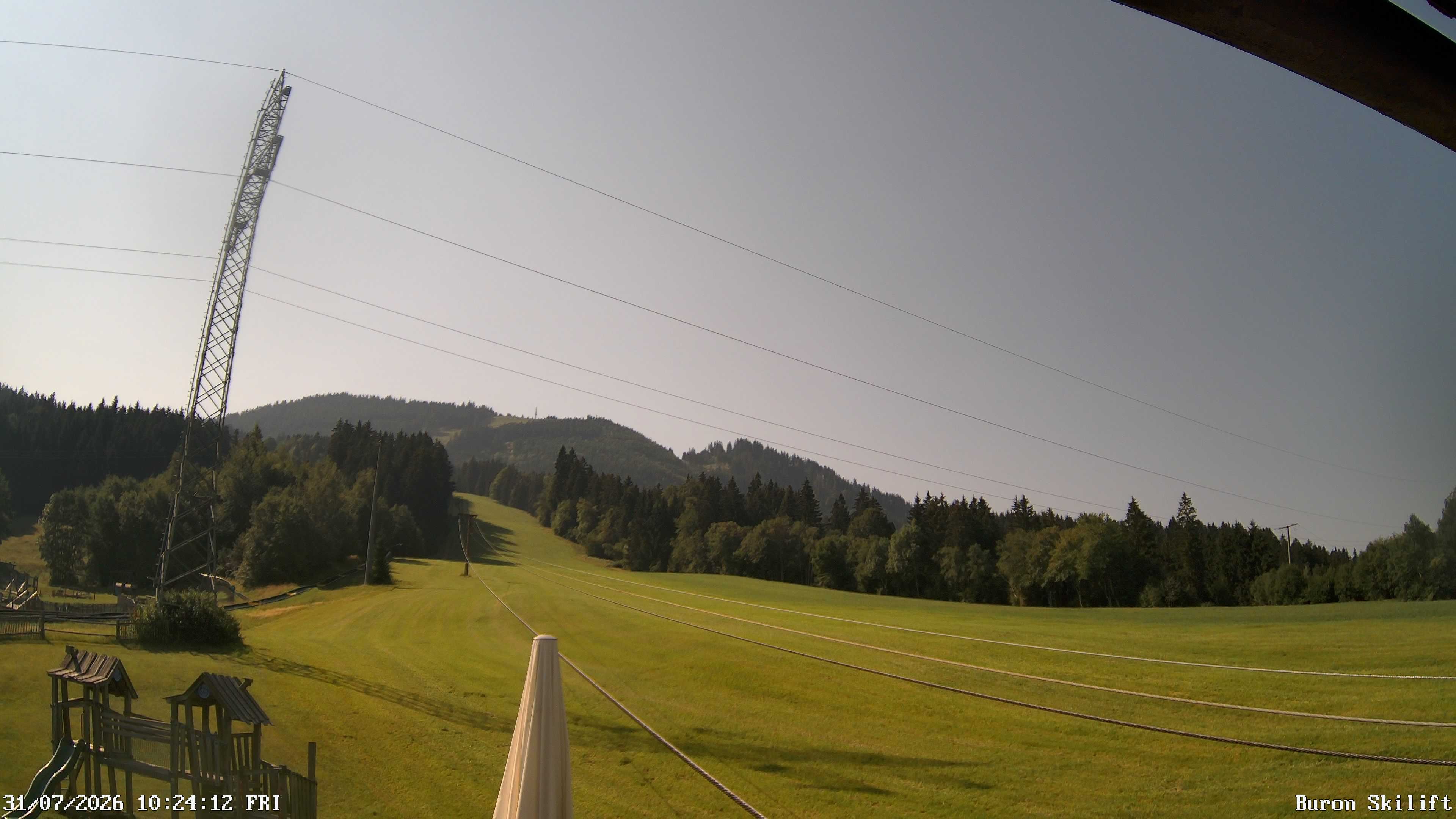 Archived image Webcam Enjoy the panoama view of the ski trail and lift in Buron