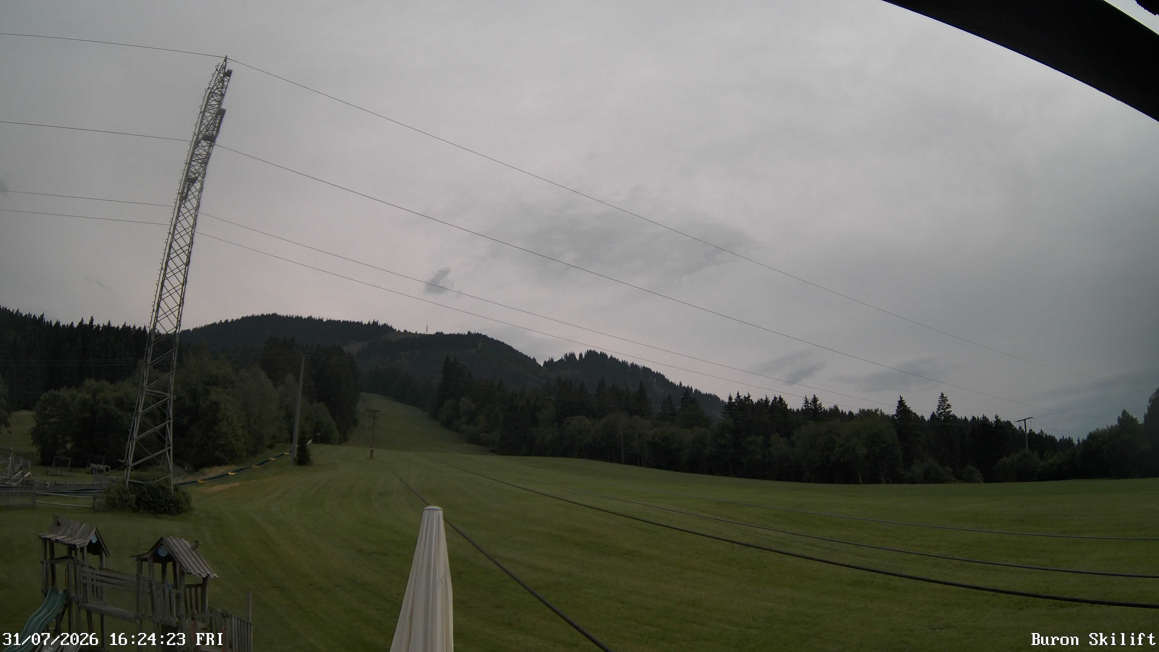 Archived image Webcam Enjoy the panoama view of the ski trail and lift in Buron