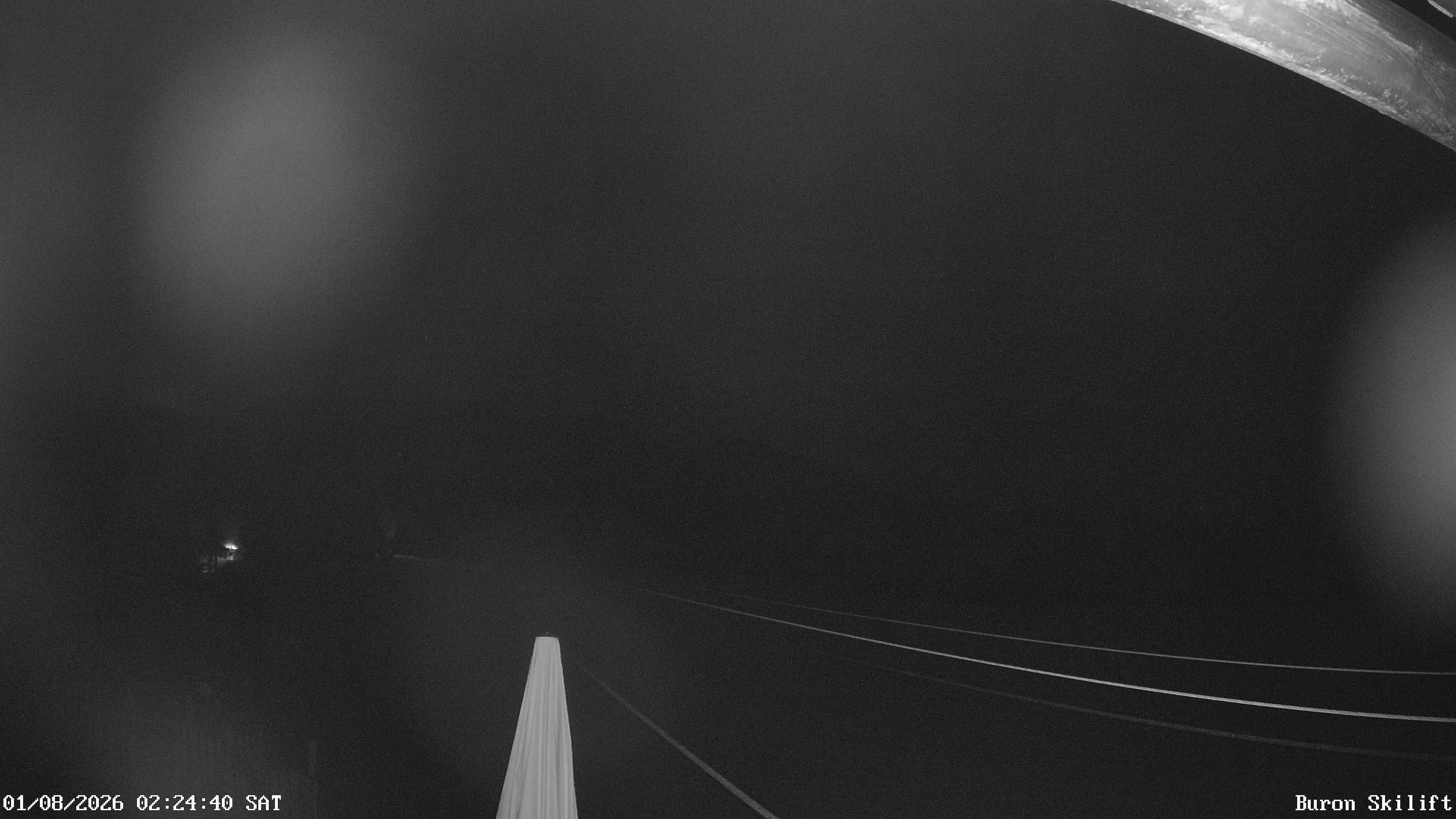 Archiv Foto Webcam Blick von der Talstation des Schlepplifts Buron auf den Lift und die Piste
