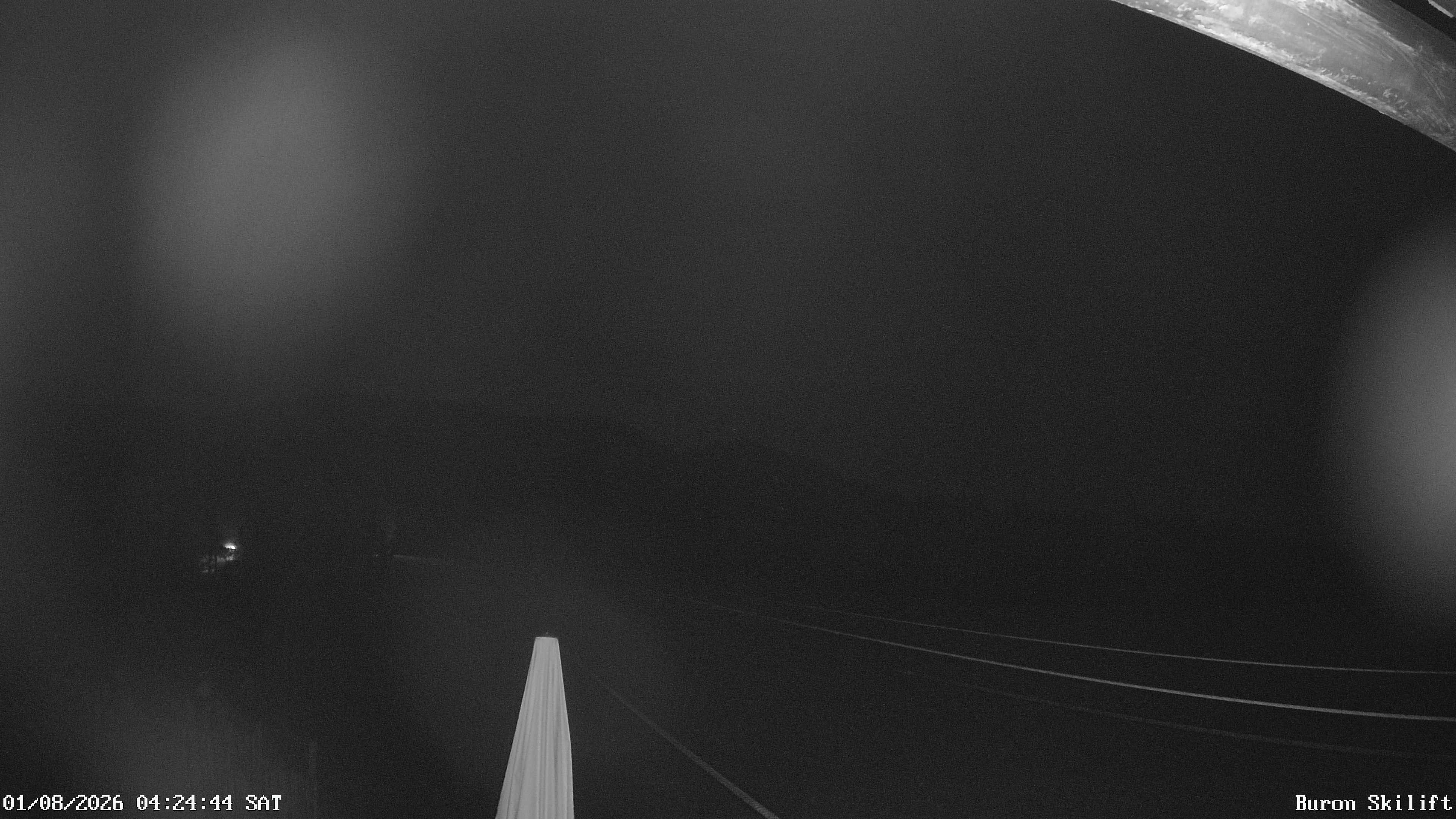 Archiv Foto Webcam Blick von der Talstation des Schlepplifts Buron auf den Lift und die Piste