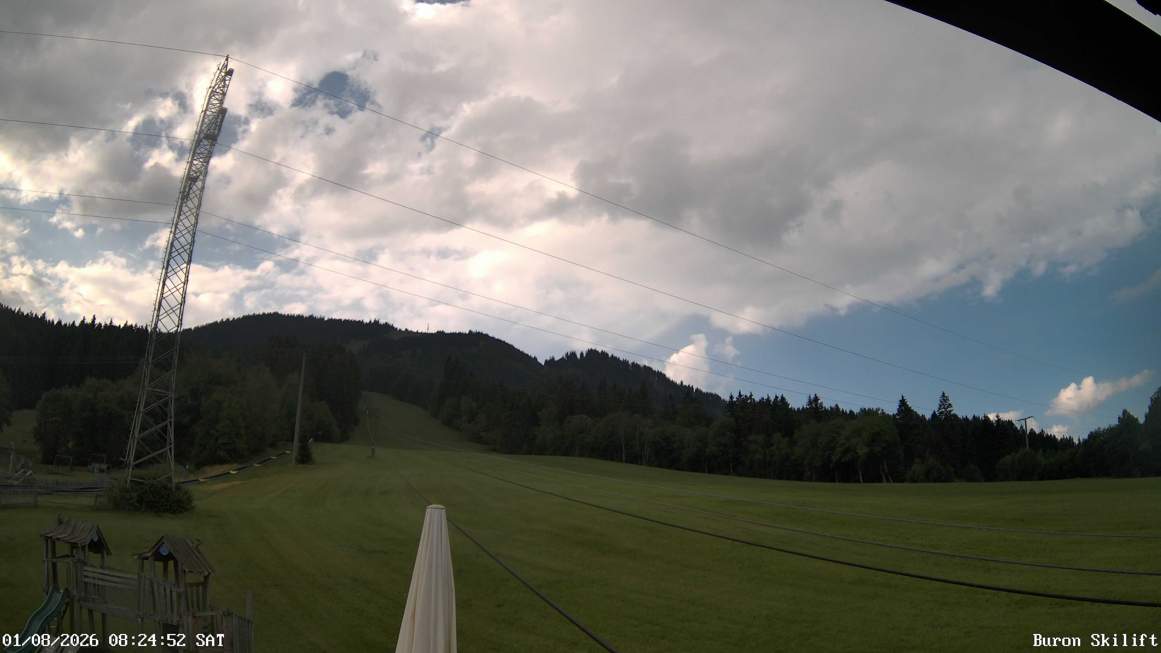 Archiv Foto Webcam Blick von der Talstation des Schlepplifts Buron auf den Lift und die Piste