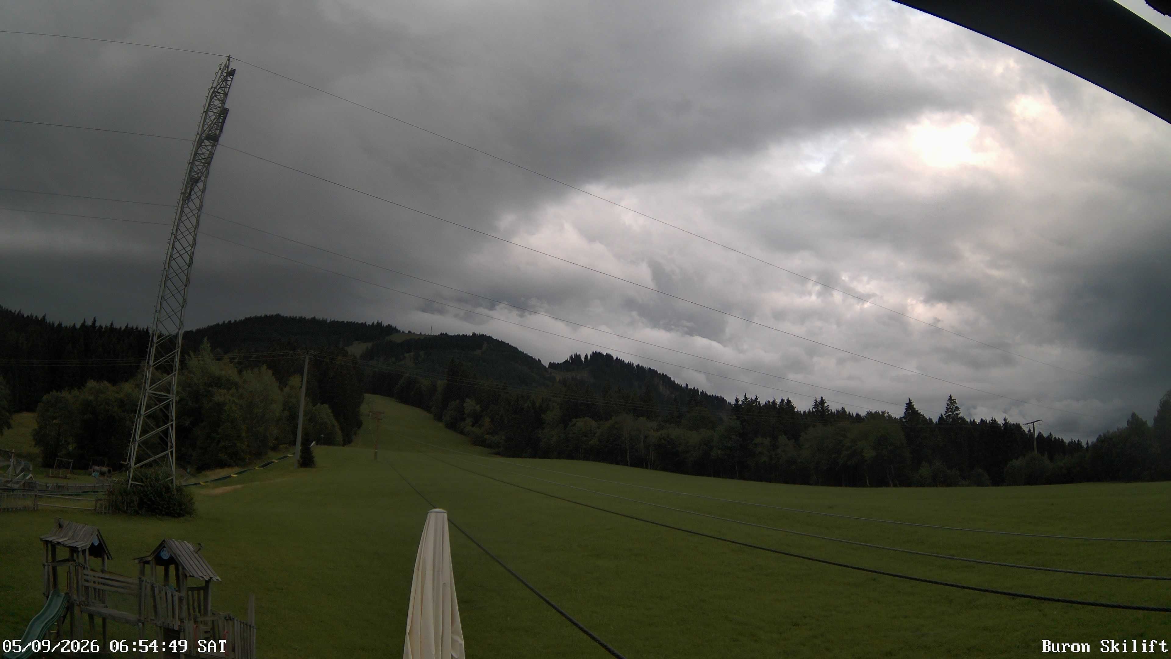 Archiv Foto Webcam Blick von der Talstation des Schlepplifts Buron auf den Lift und die Piste
