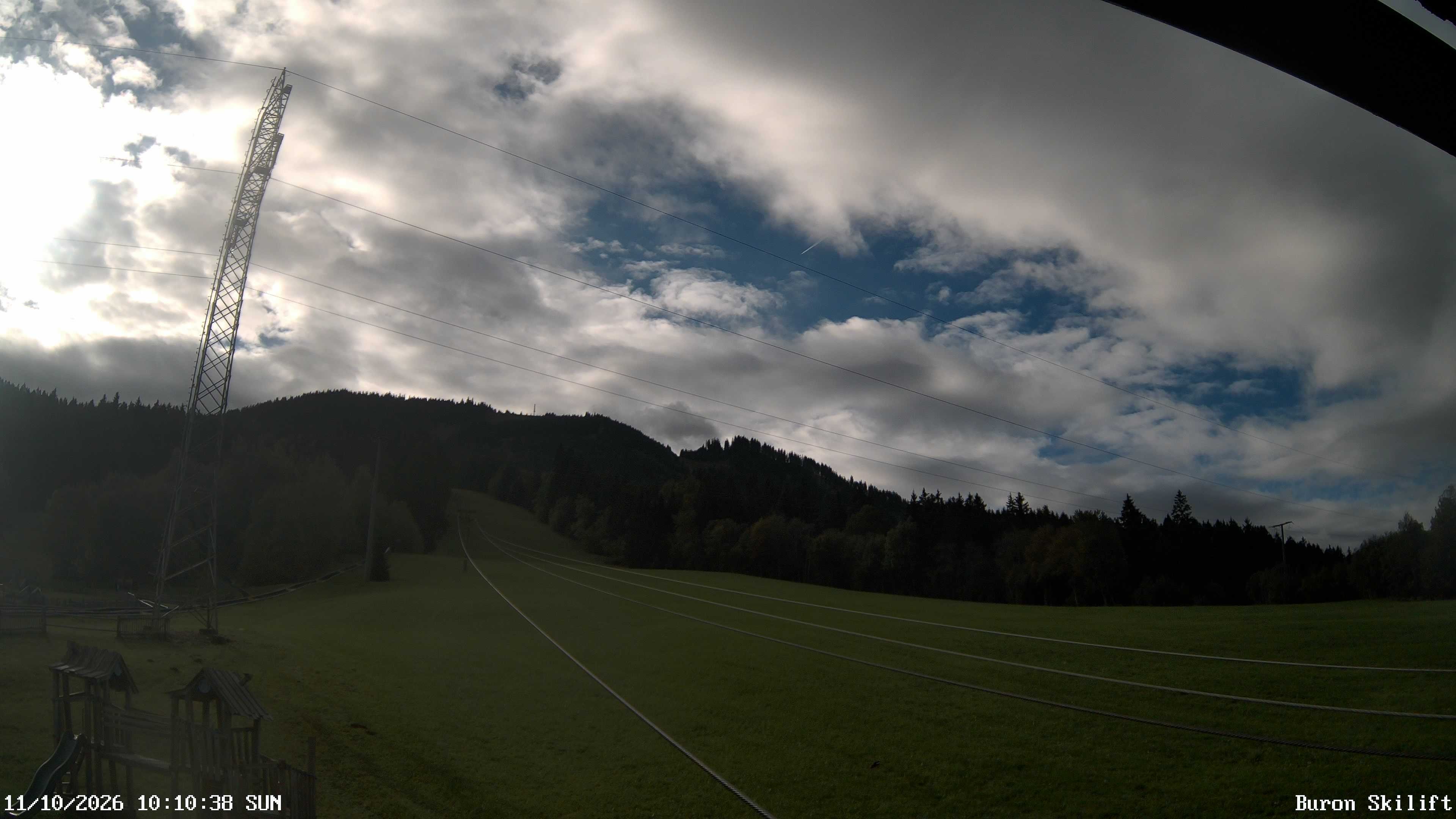 Archived image Webcam Enjoy the panoama view of the ski trail and lift in Buron
