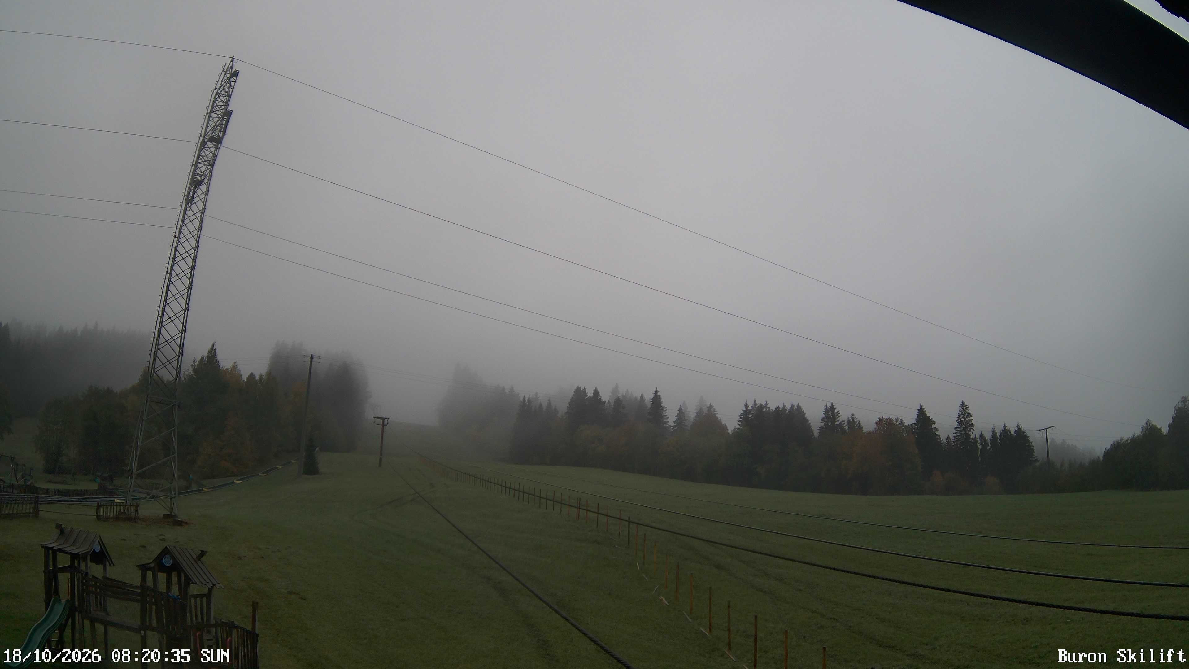 Archived image Webcam Enjoy the panoama view of the ski trail and lift in Buron