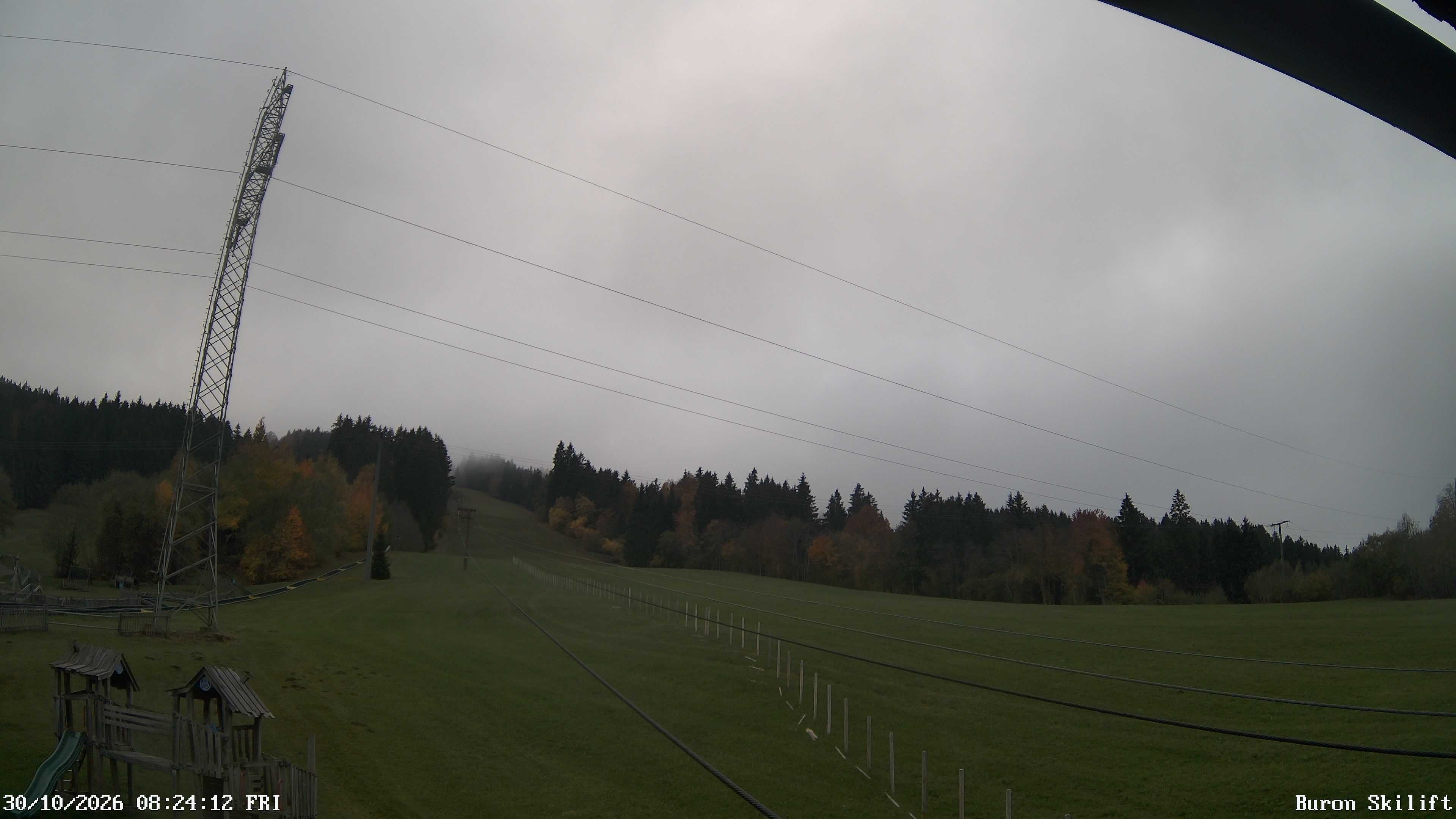 Archiv Foto Webcam Blick von der Talstation des Schlepplifts Buron auf den Lift und die Piste