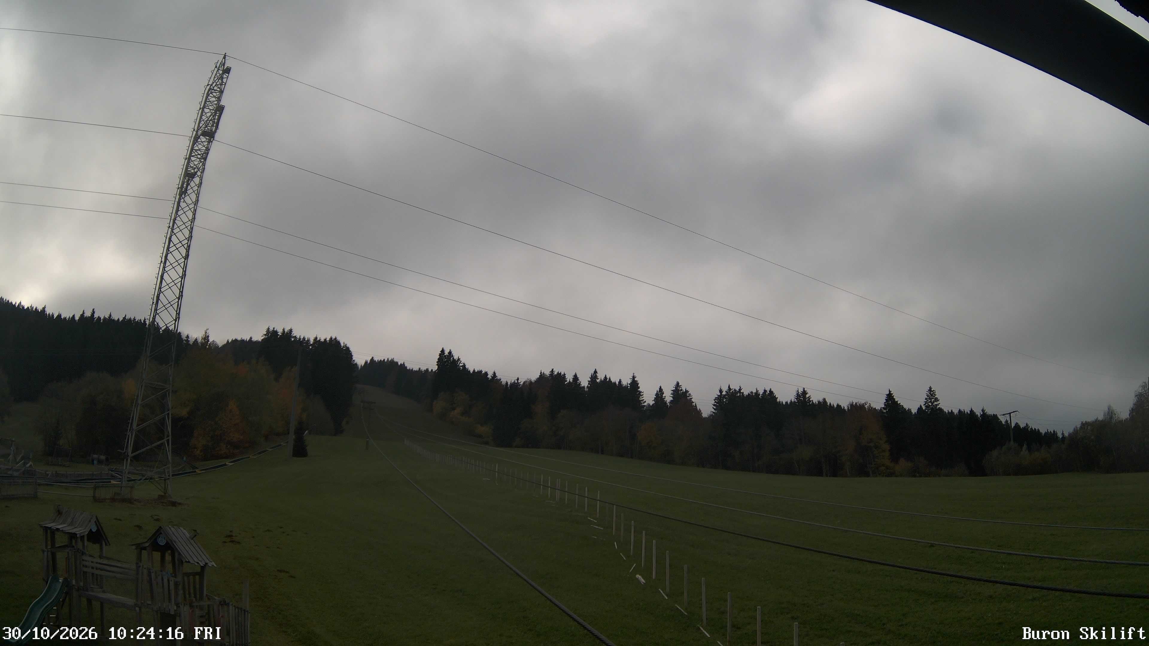 Archiv Foto Webcam Blick von der Talstation des Schlepplifts Buron auf den Lift und die Piste