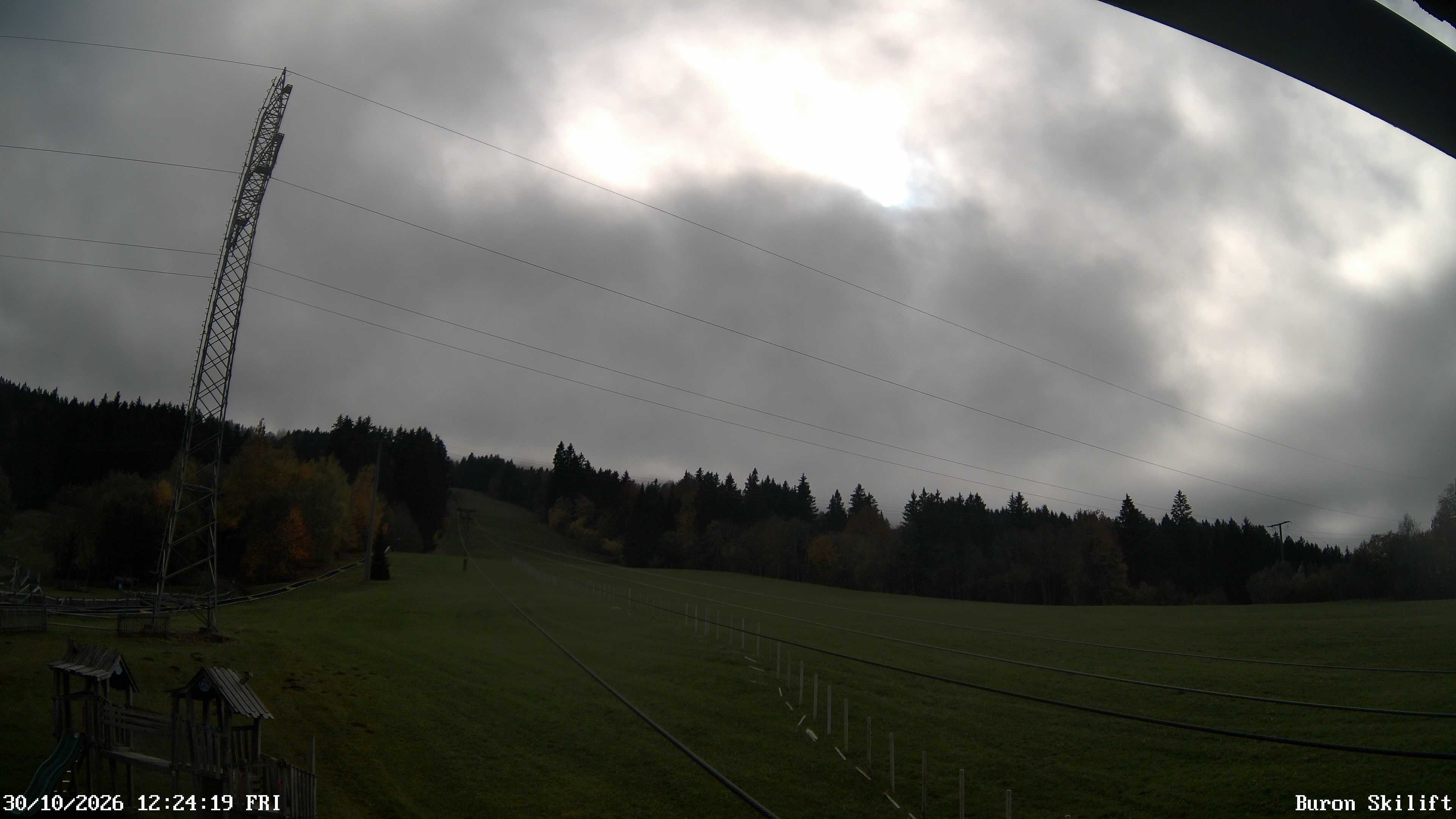 Archiv Foto Webcam Blick von der Talstation des Schlepplifts Buron auf den Lift und die Piste