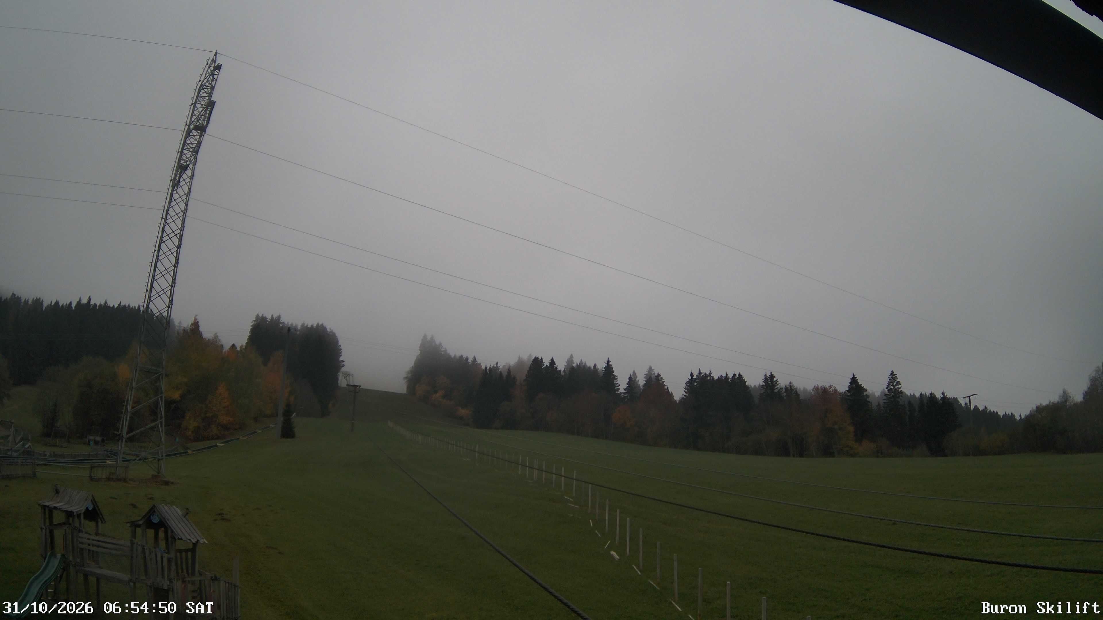 Archived image Webcam Enjoy the panoama view of the ski trail and lift in Buron