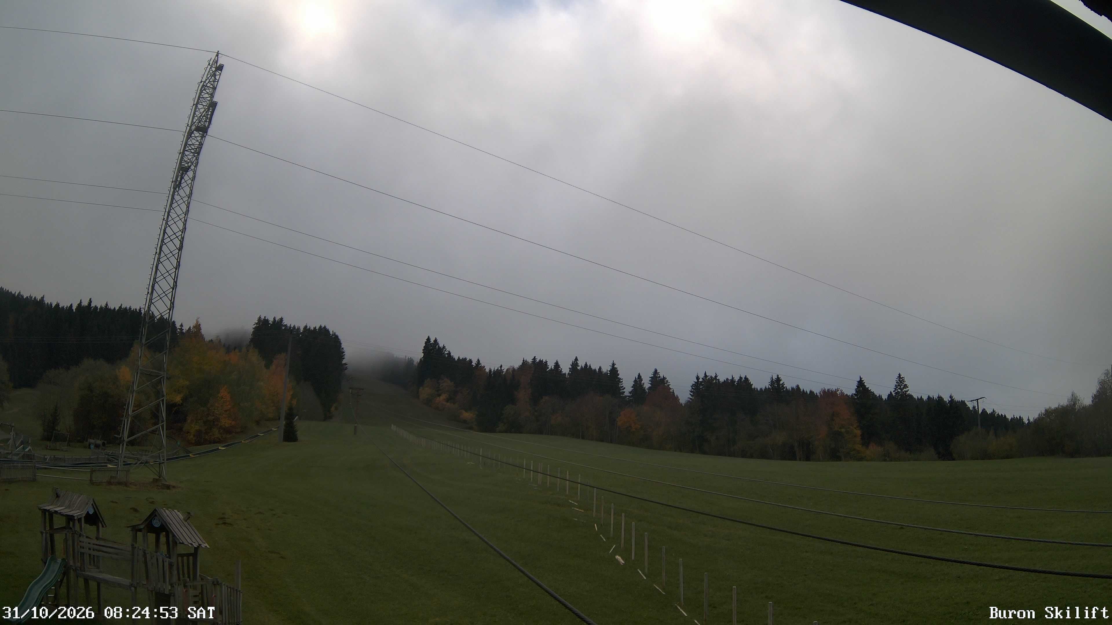 Archived image Webcam Enjoy the panoama view of the ski trail and lift in Buron