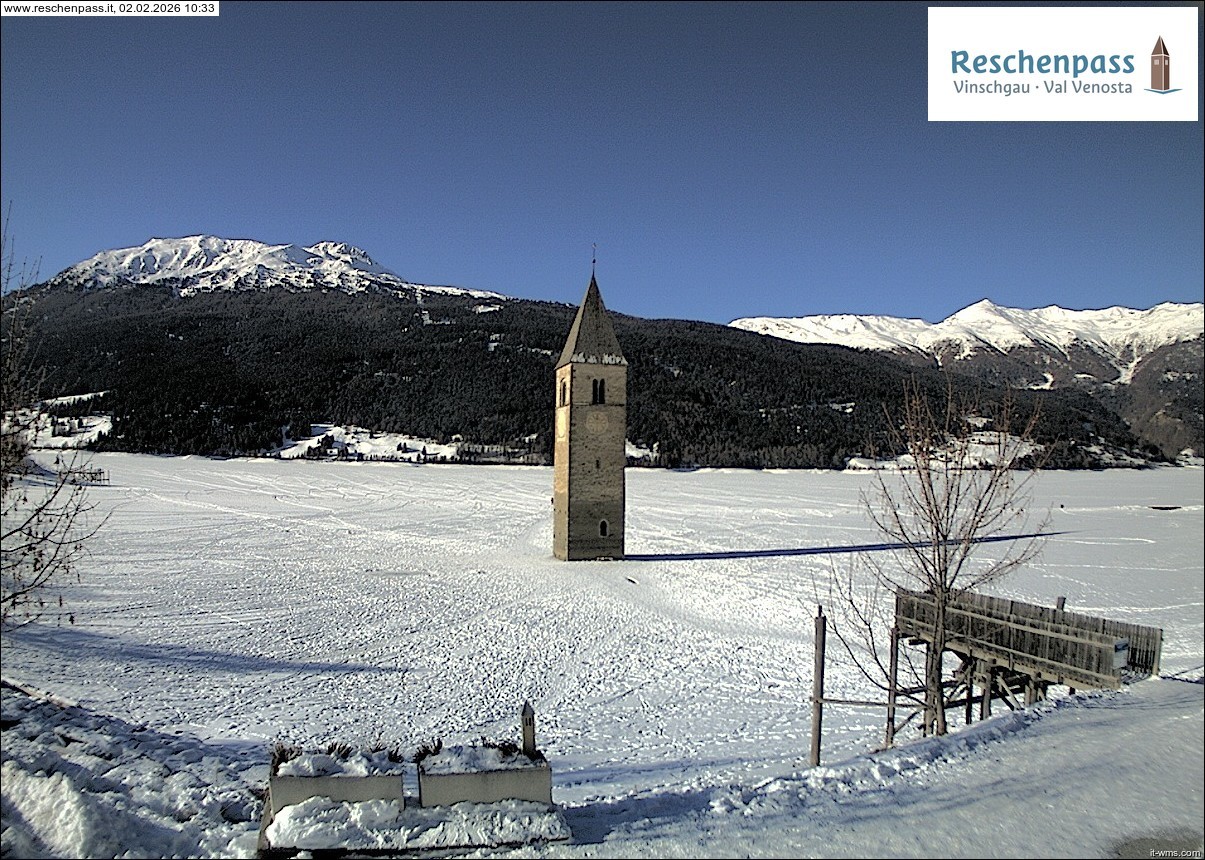 Archived image Webcam Lake Resia and the symbol of Venosta Valley