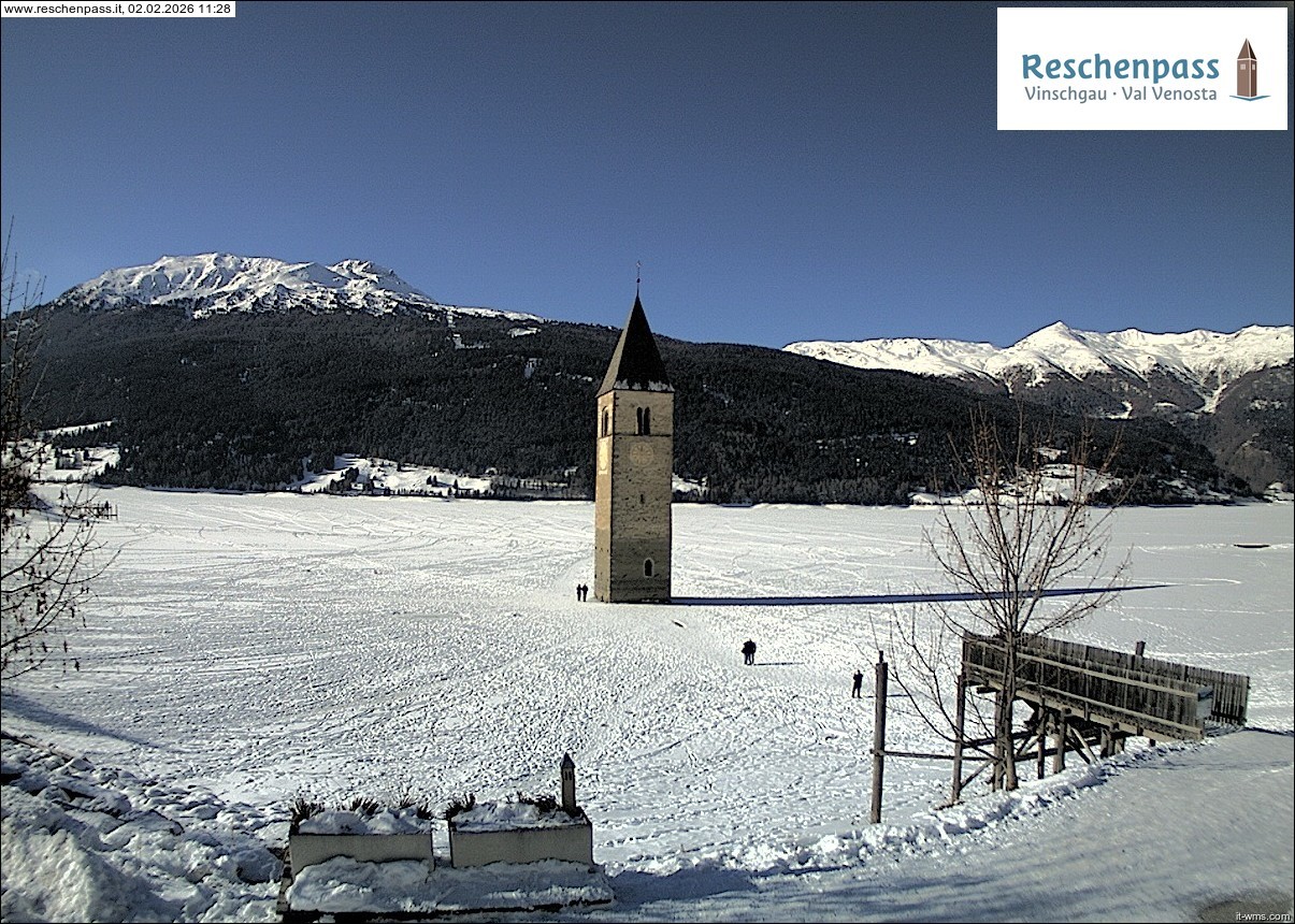 Archived image Webcam Lake Resia and the symbol of Venosta Valley