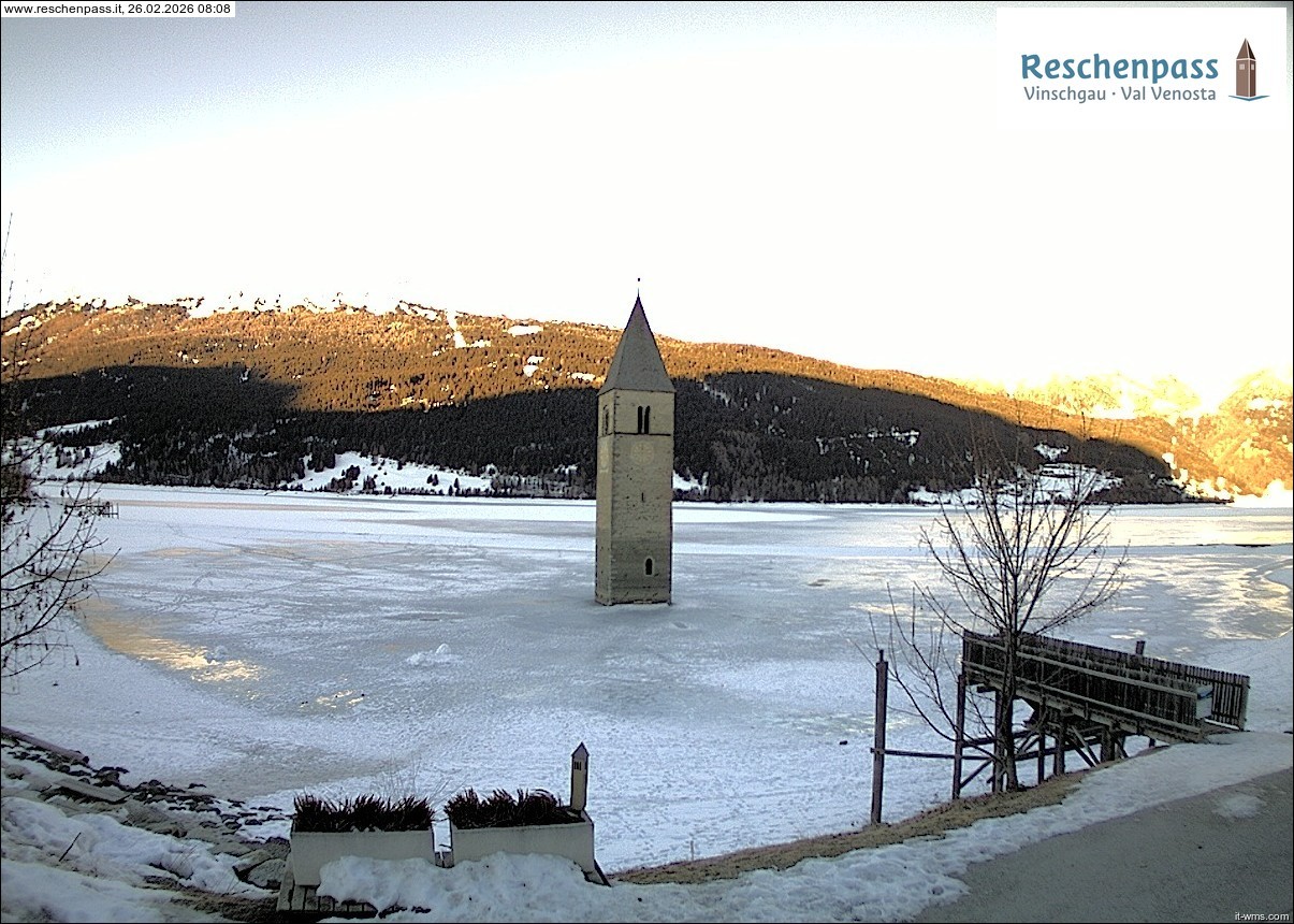 Archived image Webcam Lake Resia and the symbol of Venosta Valley