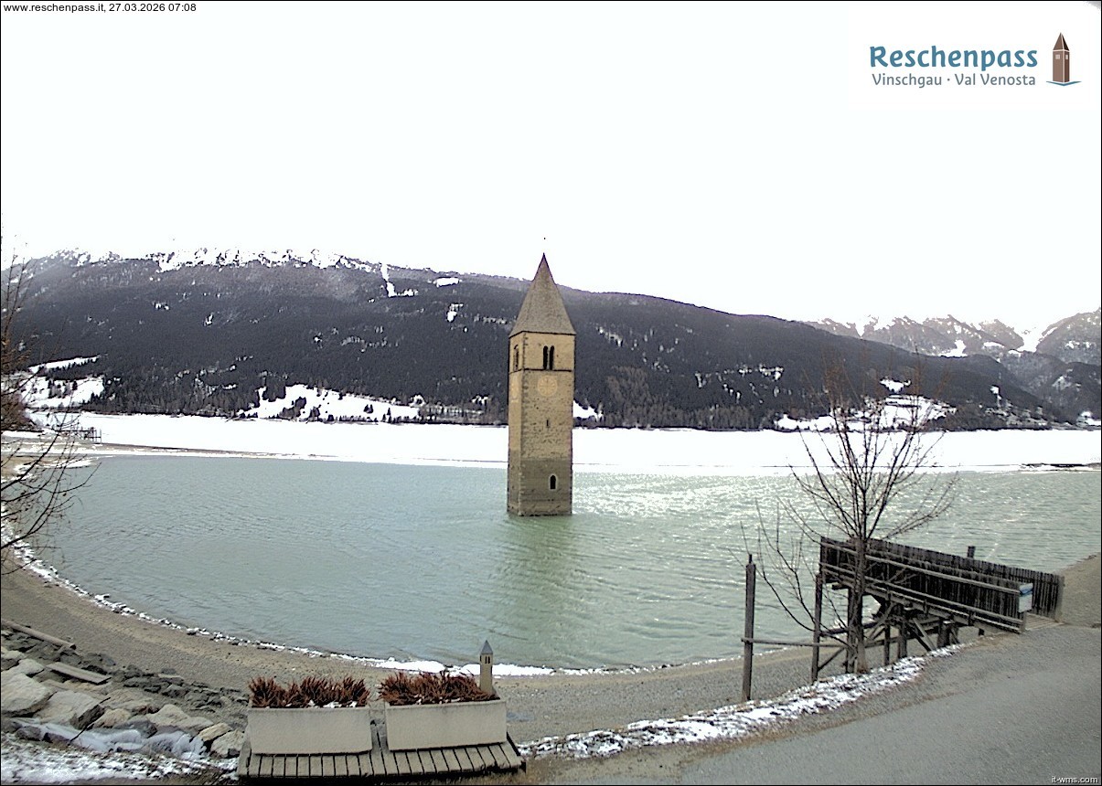Archived image Webcam Lake Resia and the symbol of Venosta Valley