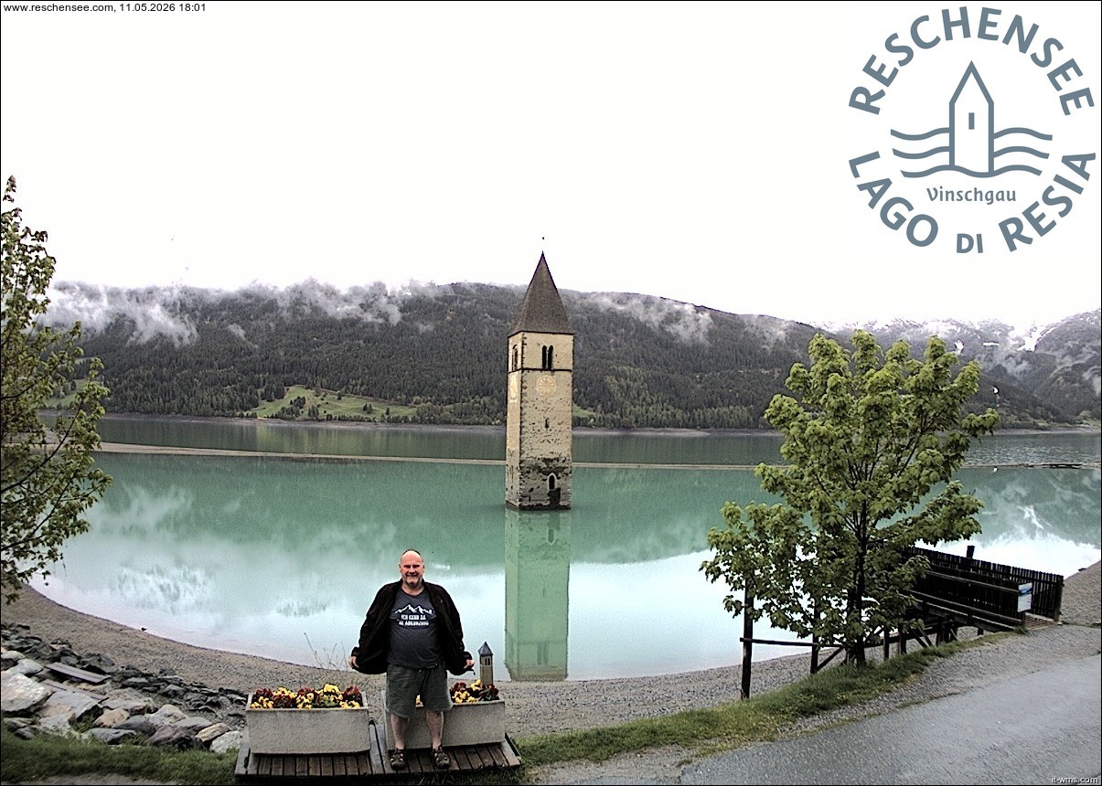 Archived image Webcam Lake Resia and the symbol of Venosta Valley
