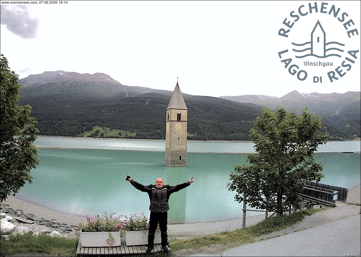 Archived image Webcam Lake Resia and the symbol of Venosta Valley