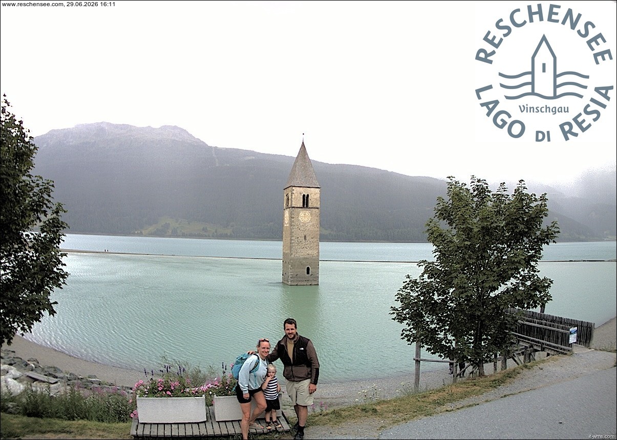 Archived image Webcam Lake Resia and the symbol of Venosta Valley